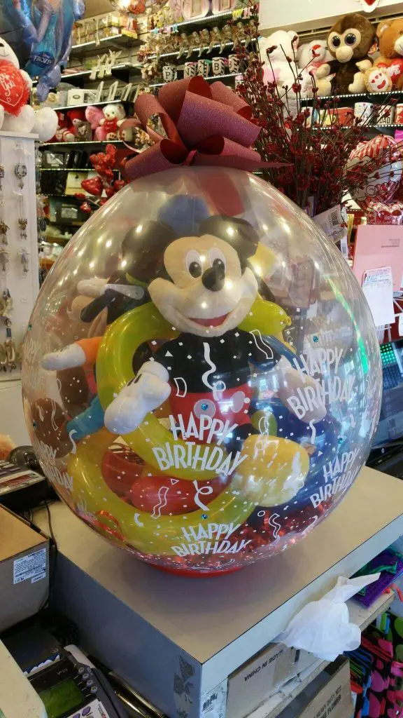 Yellow Red White and Blue Mickey mouse gift in the round clear balloon Bouquet for special Event in NYC