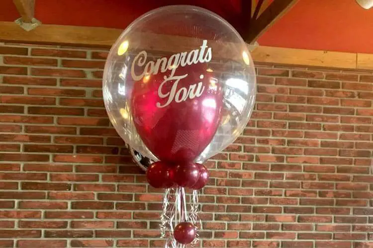Red and White latex balloon With round clear burgundy customized balloons in NJ.