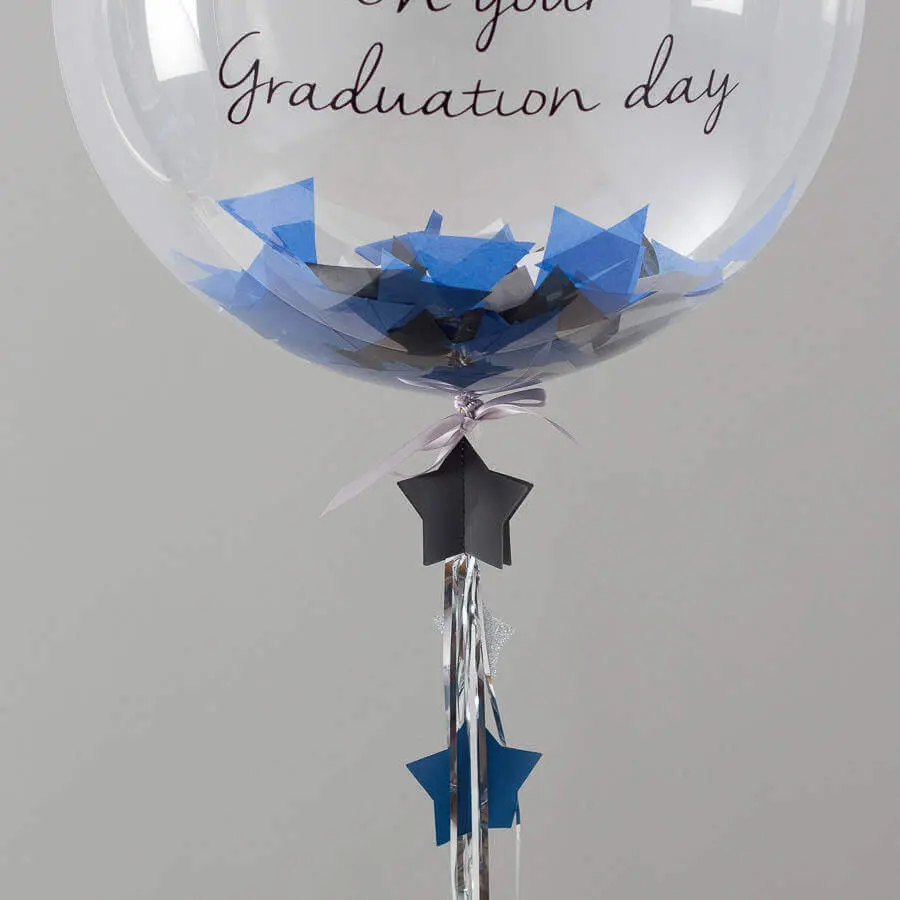 Balloons Lane in New Jersey uses dark blue, silver, black, and sapphire blue balloons, round clear graduation balloons with confetti, event party confetti, and transparent balloons.