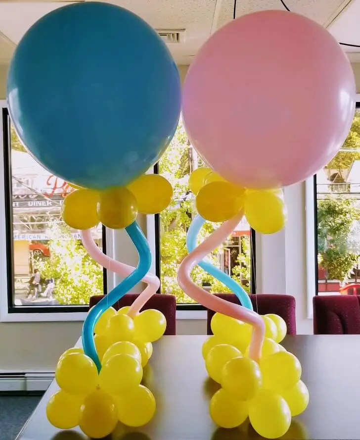 Jumbo baby shower balloons in pearl azure, pink, and yellow colors by Balloons Lane Balloon in NYC.