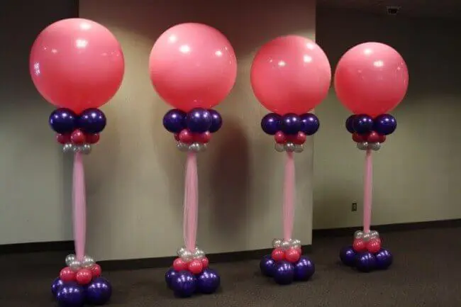 Pink, purple, and silver balloons with mini chrome balloons for christening occasion.