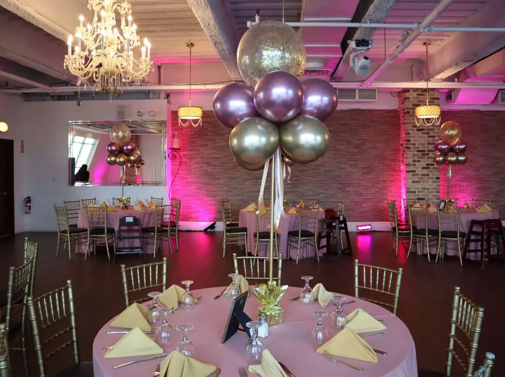 Cute Chrome® Purple and Chrome Silver balloon centerpieces for a baby's 1st birthday party