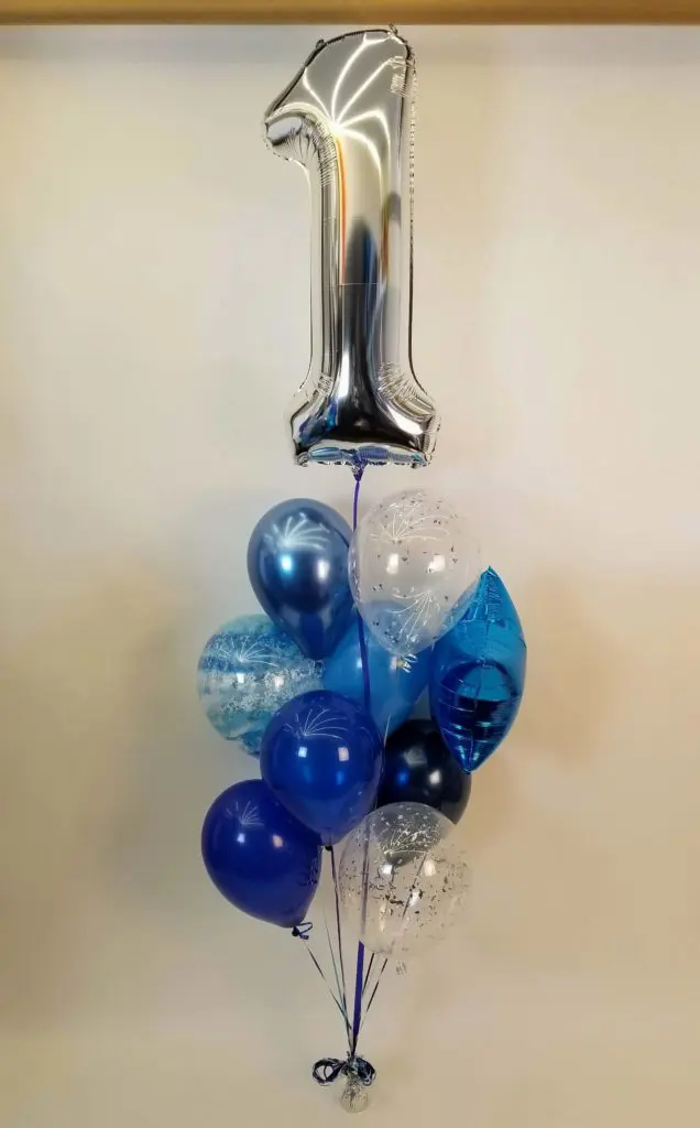 Chrome Blue, Navy Blue, Dark Blue, and Silver balloon decorations with Number 1 in Silver Balloons Bouquet for first birthday balloon decoration in NYC.