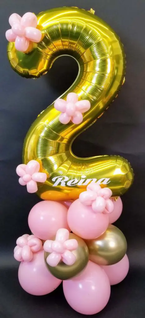 A beautiful balloon column in pink, gold, and chrome gold colors, featuring gold number 2 balloon, created by Balloons Lane in Staten Island for a 2nd birthday celebration.